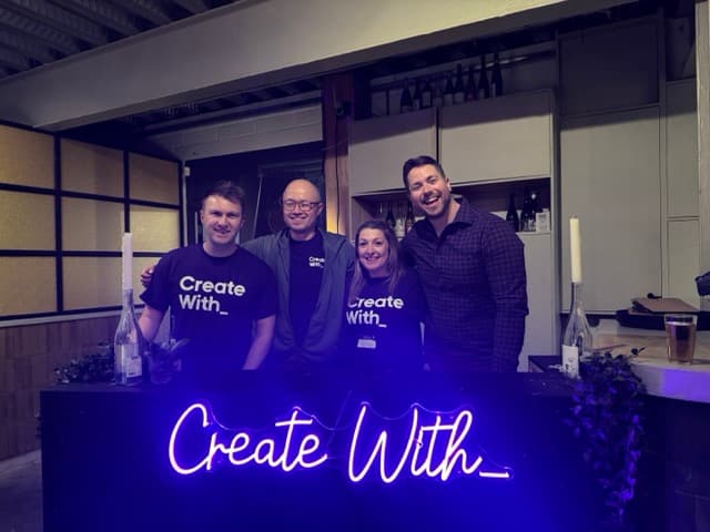 Create With team with neon sign