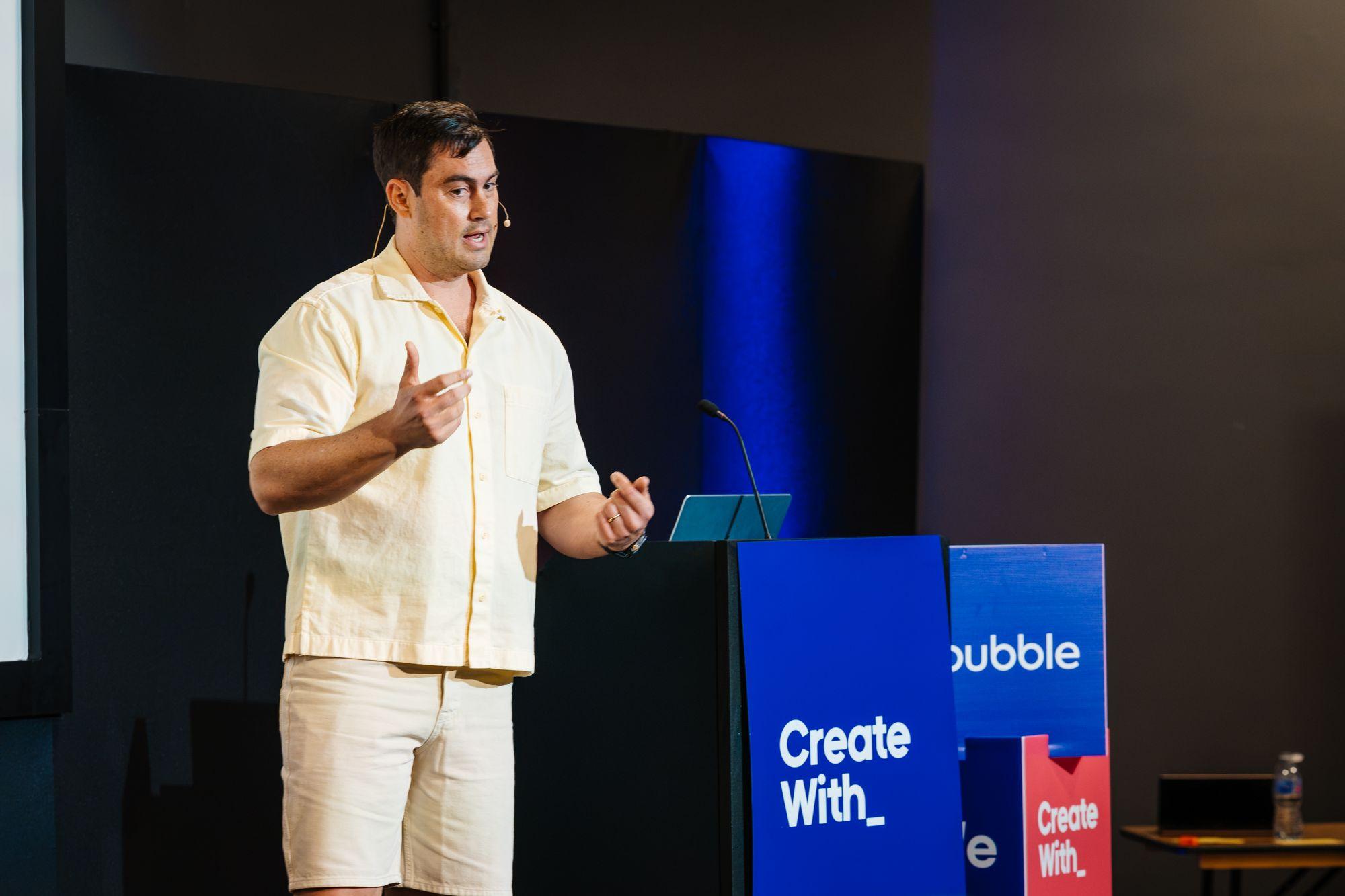 A speaker at the Bubble and Create With lectern