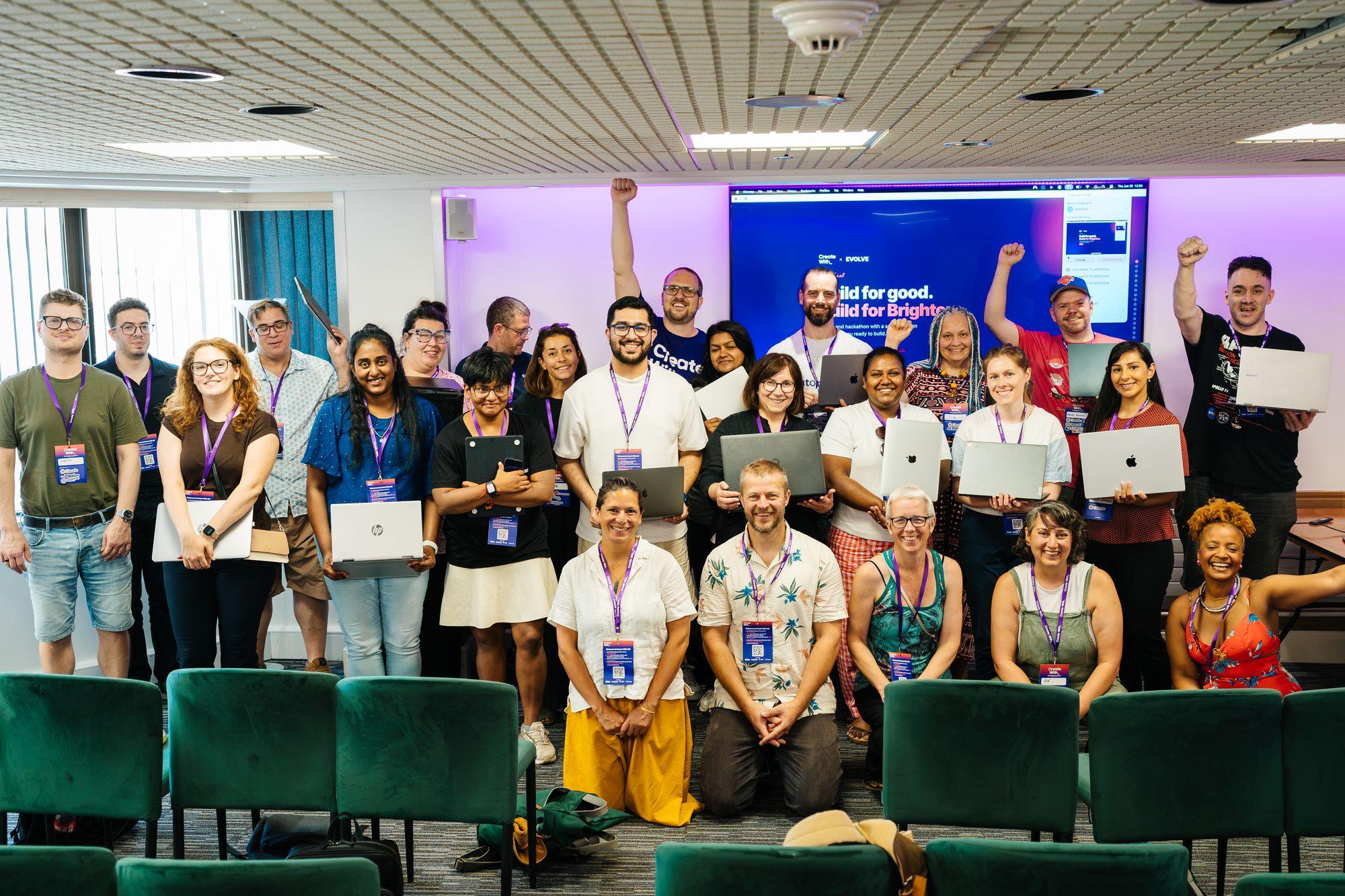 Hackathon participants with their laptops