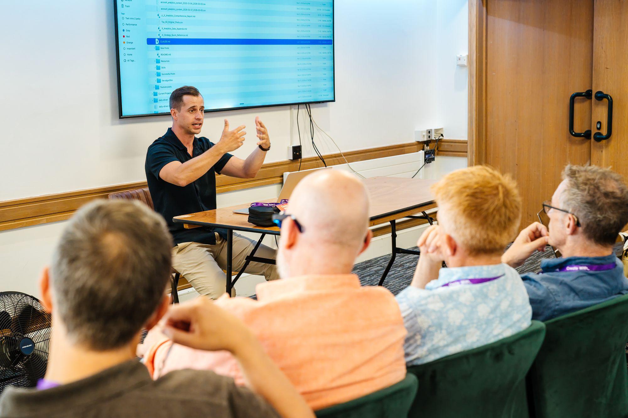 A workshop facilitator talking with attendees