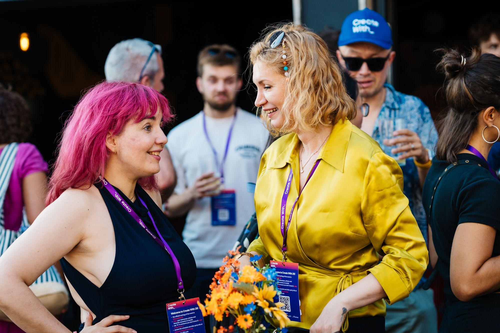 Attendees chatting outdoors at the afterparty